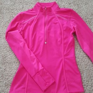 Athlete Hot pink half zip pull over .